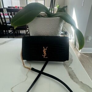SOLD Yves Saint Laurent Cassandra phone holder in crocodile embossed leather